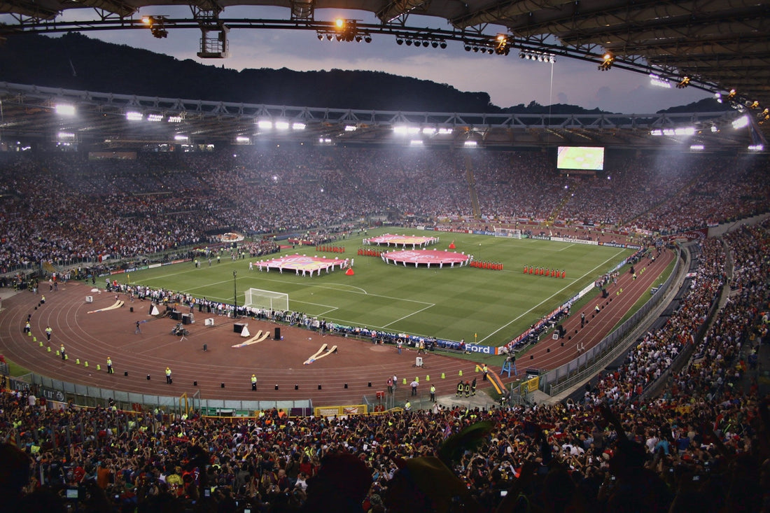 Packed bowl of the Stadio Olimpico in Rome at dusk