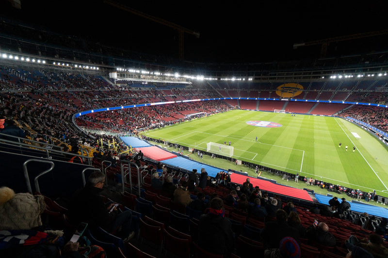 Ultra-wide night view of the Camp Nou from a high stand